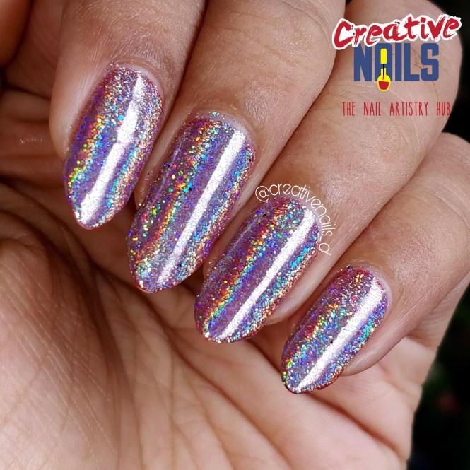 Holographic Flakies Nail Art On Red Base - sunlight