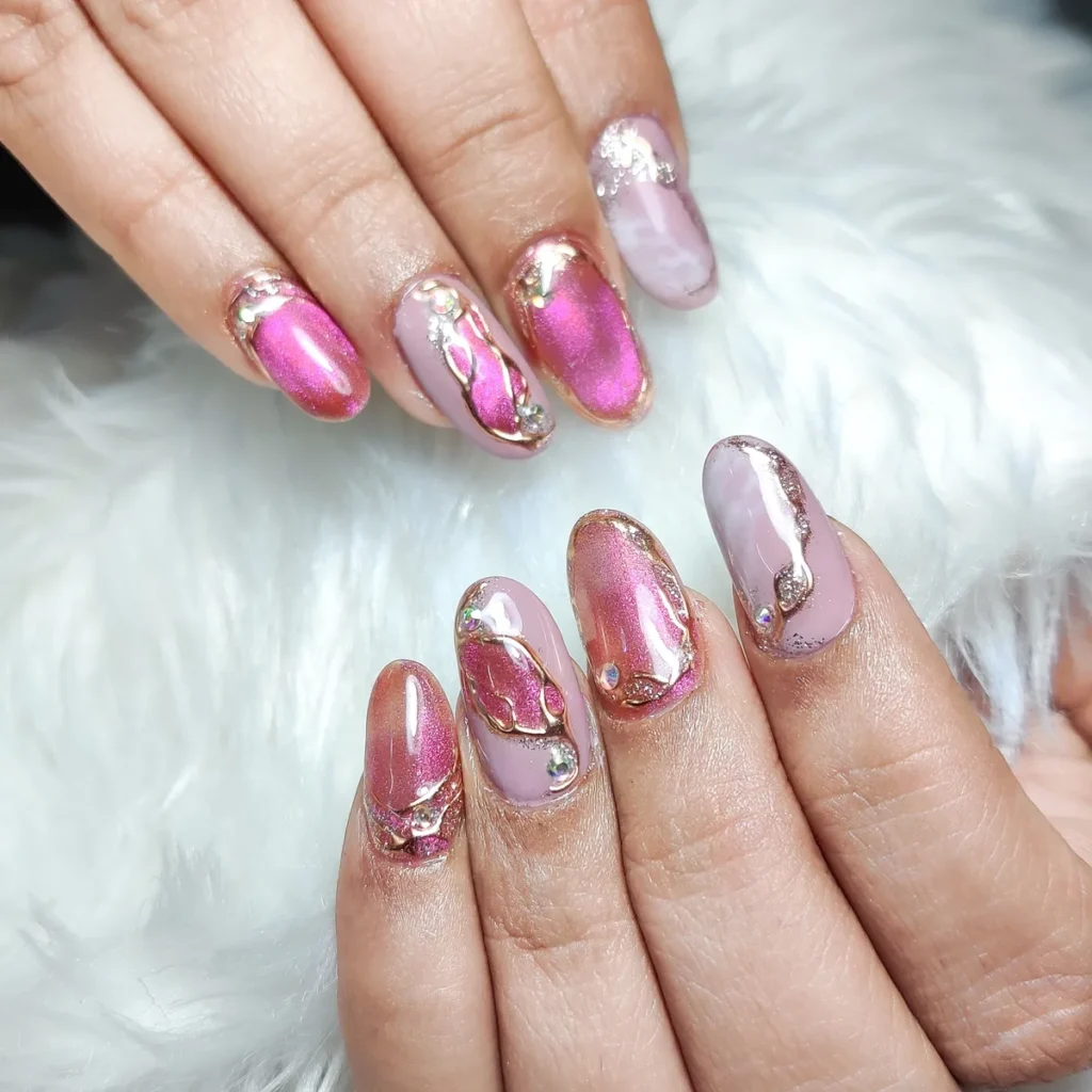 Bridal burgundy nail extensions with rose gold accent by Creative Nails Mumbai