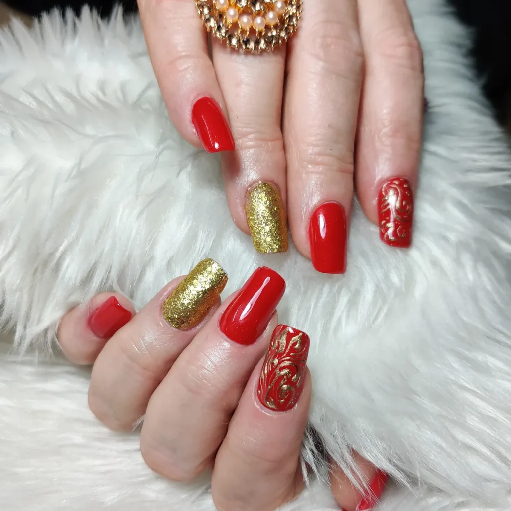 Classic bridal red nail extensions with gold accent by Creative Nails, Vile Parle East